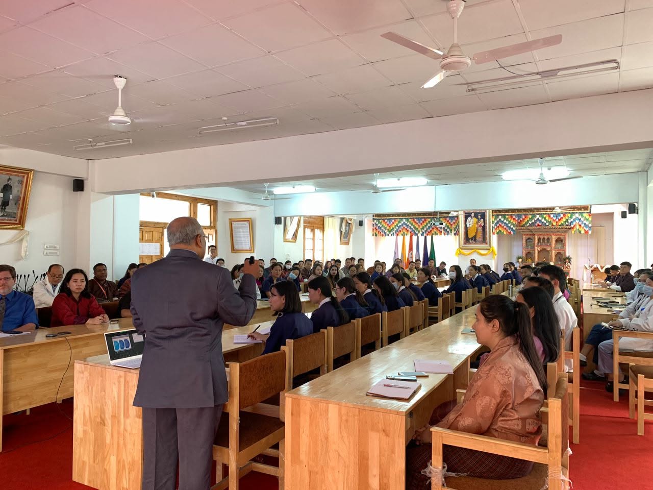 Cherian Varghese delivering a technical workshop to health professionals in Bhutan
